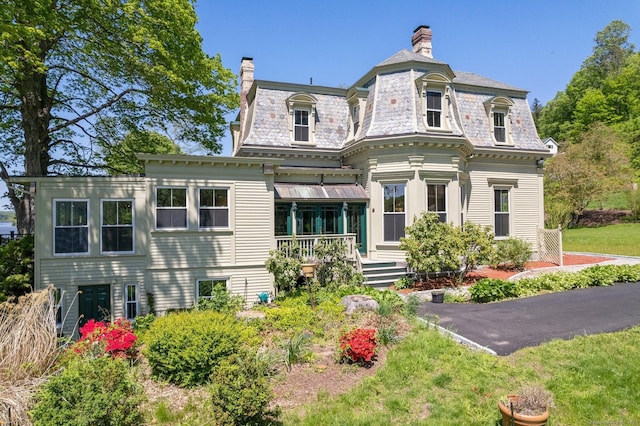 77 Main St, East Haddam, CT 06423 - rear view of house featuring a high end roof, mansard roof, and a chimney