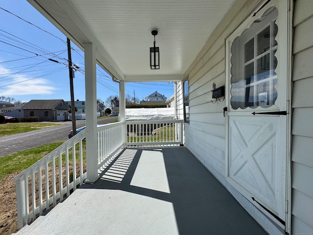 balcony featuring a porch