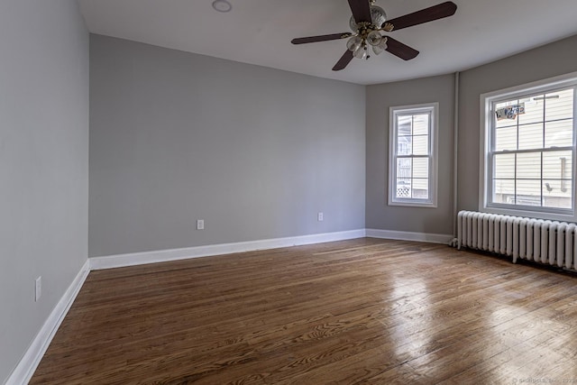 67-69 Sterling St, Hartford, CT 06154 - spare room featuring baseboards, radiator, ceiling fan, and wood finished floors