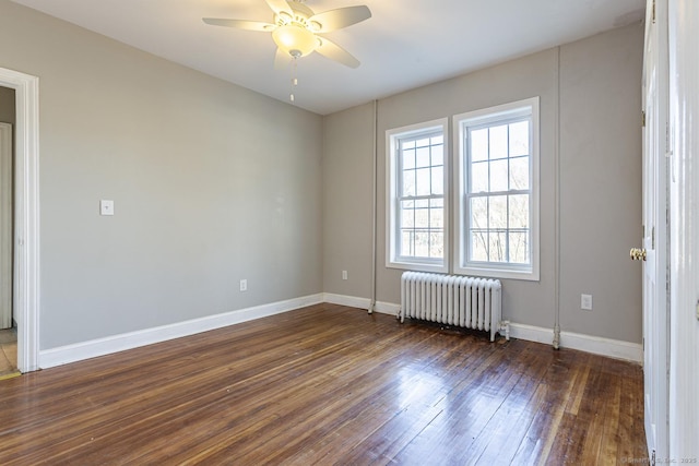 67-69 Sterling St, Hartford, CT 06154 - empty room with baseboards, a ceiling fan, radiator, and dark wood finished floors