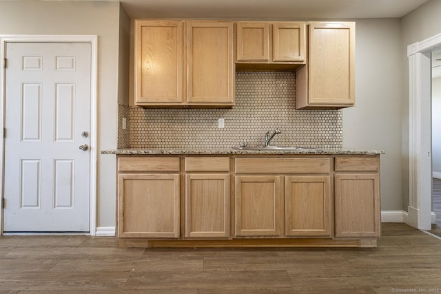 67-69 Sterling St, Hartford, CT 06154 - kitchen with dark wood-type flooring, backsplash, and light brown cabinetry