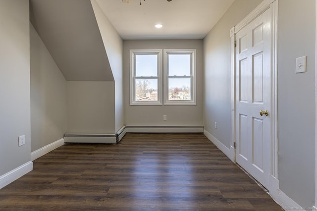 67-69 Sterling St, Hartford, CT 06154 - additional living space featuring baseboards, a baseboard heating unit, vaulted ceiling, and dark wood-style floors