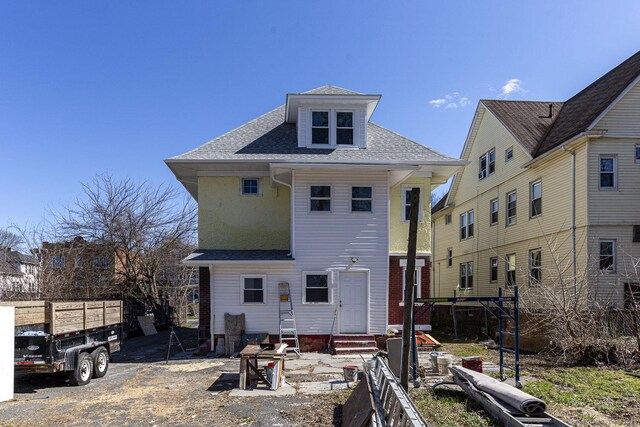67-69 Sterling St, Hartford, CT 06154 - back of house featuring entry steps, fence, and a shingled roof
