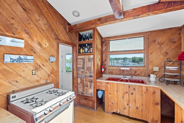 0 Burr Is, Branford, CT 06405 - kitchen featuring light wood-type flooring, gas range, wooden walls, and beam ceiling