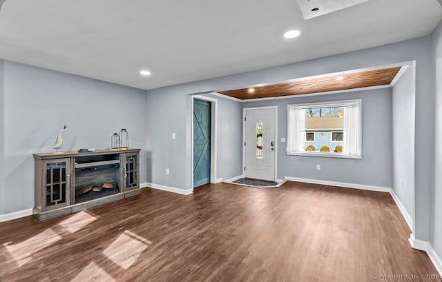 entryway with wood finished floors, recessed lighting, and baseboards