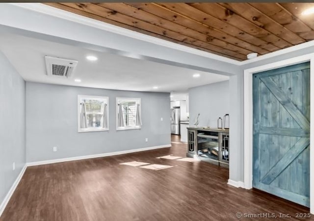 unfurnished living room featuring dark wood finished floors, baseboards, visible vents, and recessed lighting