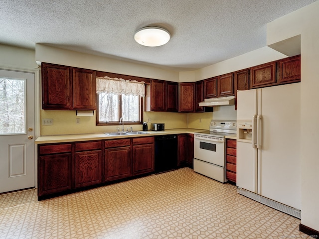 kitchen with a sink, light countertops, white appliances, a textured ceiling, and under cabinet range hood