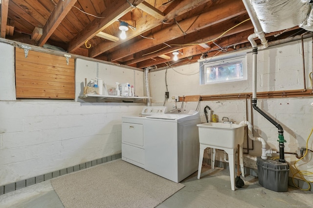 laundry room featuring laundry area and separate washer and dryer