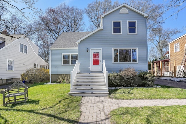 view of front facade with a front yard