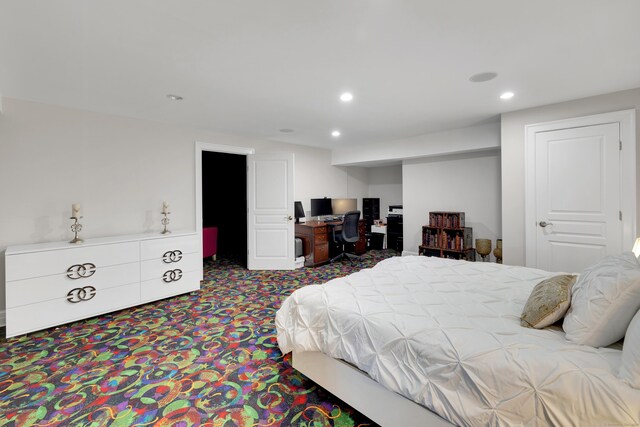 carpeted bedroom with recessed lighting