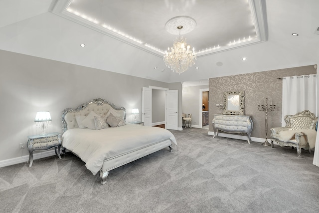 bedroom featuring carpet, lofted ceiling, a raised ceiling, baseboards, and a notable chandelier