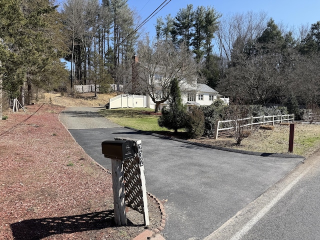 view of street featuring driveway