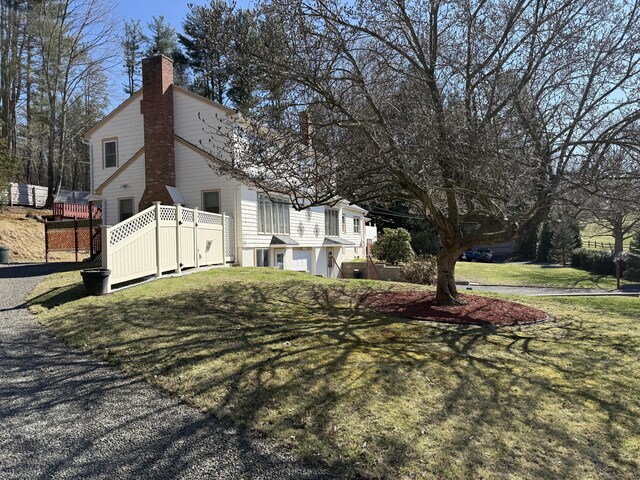 230 Old Field Rd, Southbury, CT 06488 - view of property exterior with a chimney and fence