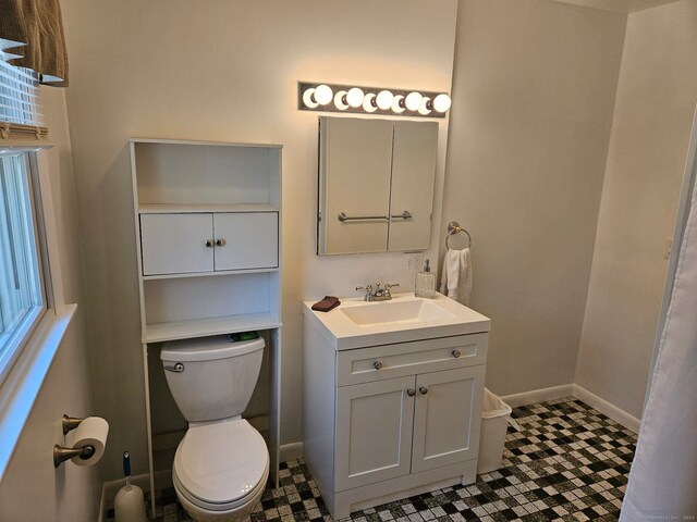 230 Old Field Rd, Southbury, CT 06488 - bathroom with toilet, vanity, tile patterned floors, and baseboards