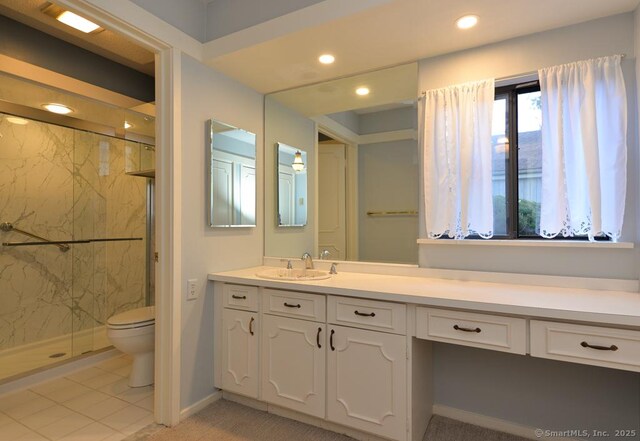 16 Heritage Vlg Unit A, Southbury, CT 06488 - full bath with a marble finish shower, vanity, and recessed lighting