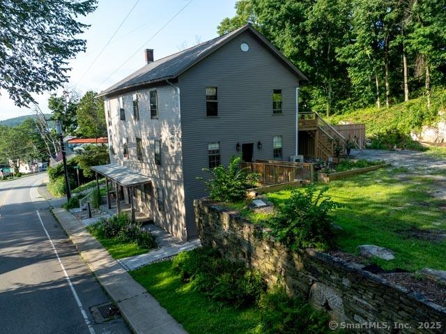 23 Main St, East Haddam, CT 06423 - view of side of home with a wooden deck and stairs