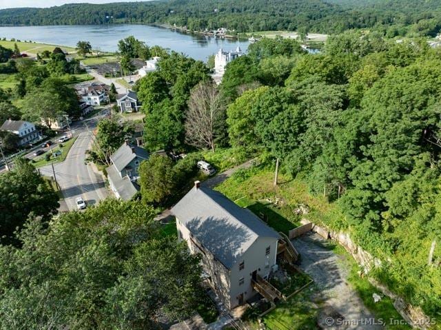 23 Main St, East Haddam, CT 06423 - aerial overview of property's location featuring a heavily wooded area and a large body of water