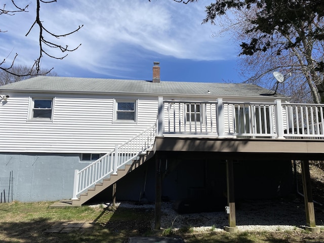 41 Wilshire Blvd, Milford, CT 06460 - rear view of house with a deck, stairway, roof with shingles, and a carport