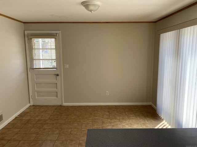 41 Wilshire Blvd, Milford, CT 06460 - spare room featuring light tile patterned flooring, baseboards, and crown molding