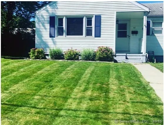 41 Wilshire Blvd, Milford, CT 06460 - view of front facade with a front lawn
