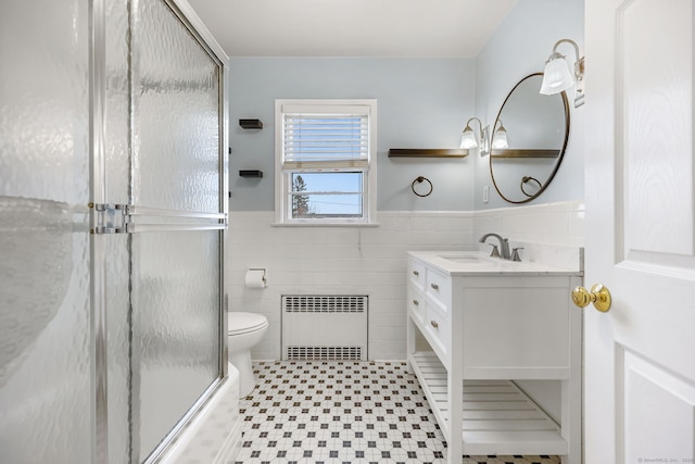 9 Pine Hill Avenue Ext, Norwalk, CT 06855 - full bathroom featuring radiator, vanity, a shower with door, toilet, and wainscoting
