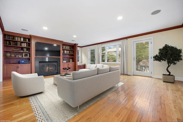 9 Pine Hill Avenue Ext, Norwalk, CT 06855 - living room featuring a fireplace, ornamental molding, recessed lighting, light wood finished floors, and baseboards