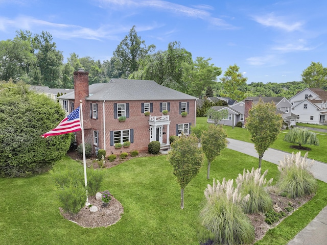 9 Pine Hill Avenue Ext, Norwalk, CT 06855 - view of front of property with a chimney, a front yard, a residential view, and brick siding