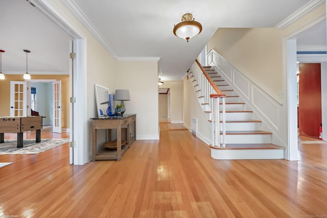 9 Pine Hill Avenue Ext, Norwalk, CT 06855 - foyer with french doors, ornamental molding, hardwood / wood-style flooring, and stairs