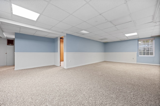 9 Pine Hill Avenue Ext, Norwalk, CT 06855 - finished below grade area featuring a drop ceiling, carpet flooring, and wainscoting