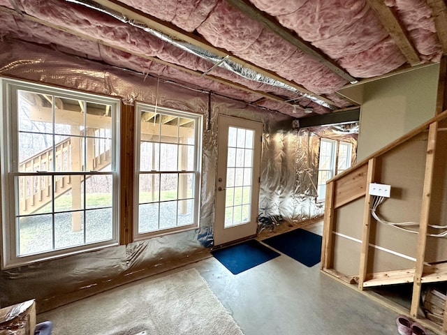 doorway to outside featuring concrete flooring