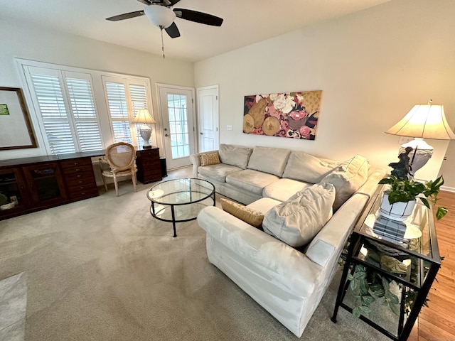 living area with ceiling fan