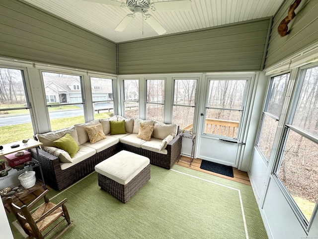sunroom / solarium with ceiling fan