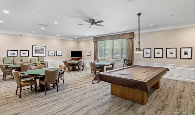 playroom with a decorative wall, crown molding, pool table, a wainscoted wall, and visible vents
