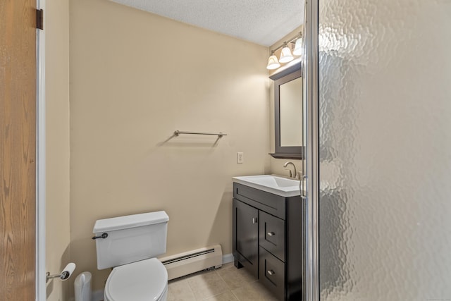 bathroom featuring vanity, tile patterned floors, a textured ceiling, toilet, and a baseboard radiator