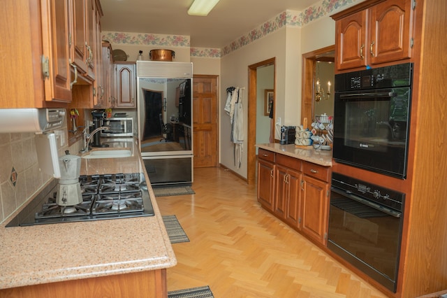 78 Limewood Ave, Branford, CT 06405 - kitchen featuring black appliances, a sink, brown cabinets, and tasteful backsplash