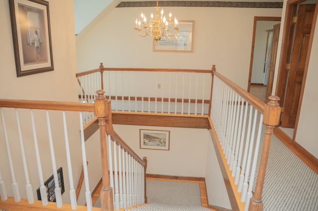 78 Limewood Ave, Branford, CT 06405 - stairway featuring a chandelier and carpet