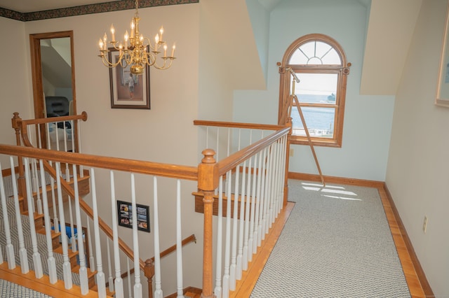 78 Limewood Ave, Branford, CT 06405 - corridor with an upstairs landing, a chandelier, and baseboards
