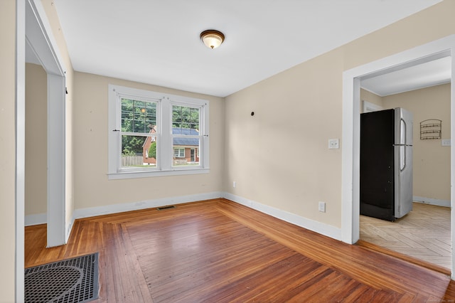 123 Fowler Avenue Ext, Meriden, CT 06451 - empty room with baseboards and wood finished floors