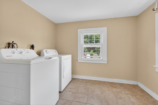 123 Fowler Avenue Ext, Meriden, CT 06451 - laundry room with washer and dryer and baseboards