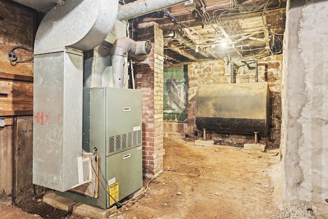 123 Fowler Avenue Ext, Meriden, CT 06451 - utility room featuring oil tank and heating unit