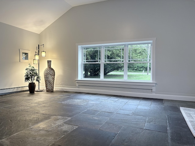 220 W Rd, Colchester, CT 06415 - unfurnished room with stone tile flooring, healthy amount of natural light, vaulted ceiling, and baseboards