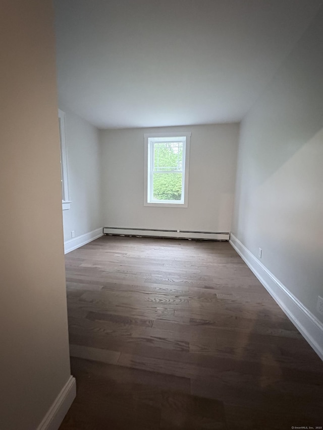 220 W Rd, Colchester, CT 06415 - spare room with a baseboard radiator, wood finished floors, and baseboards
