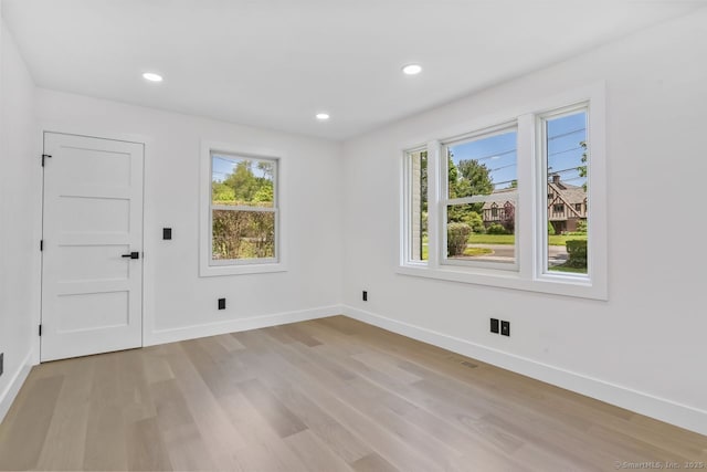 32 Pine Hill Ave, Norwalk, CT 06855 - unfurnished room featuring light wood-style floors, baseboards, healthy amount of natural light, and recessed lighting