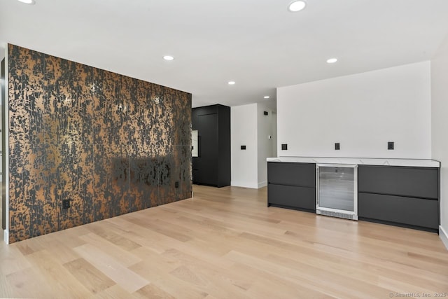 32 Pine Hill Ave, Norwalk, CT 06855 - spare room featuring beverage cooler, light wood-style flooring, recessed lighting, and baseboards