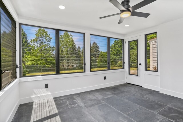 32 Pine Hill Ave, Norwalk, CT 06855 - unfurnished sunroom with a ceiling fan, baseboards, and recessed lighting