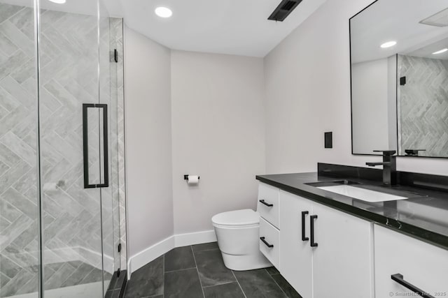 bathroom featuring vanity, baseboards, toilet, a shower stall, and recessed lighting