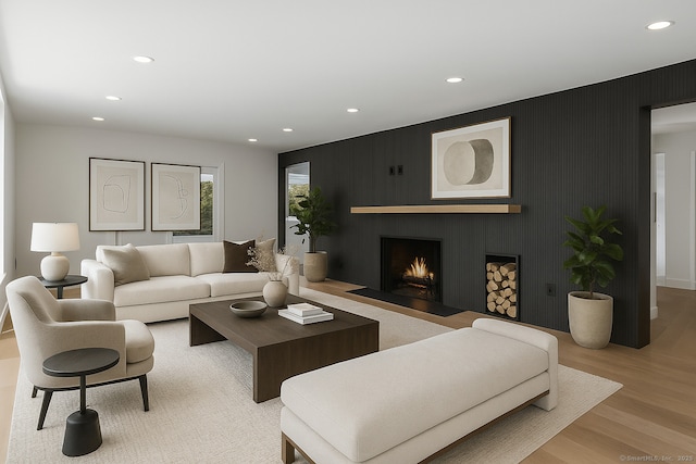 32 Pine Hill Ave, Norwalk, CT 06855 - living area featuring recessed lighting, wood finished floors, and a fireplace with flush hearth