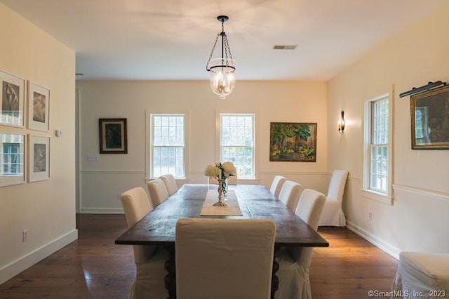 33 Sentry Hill Rd, Roxbury, CT 06783 - dining area featuring visible vents, a notable chandelier, baseboards, and wood finished floors