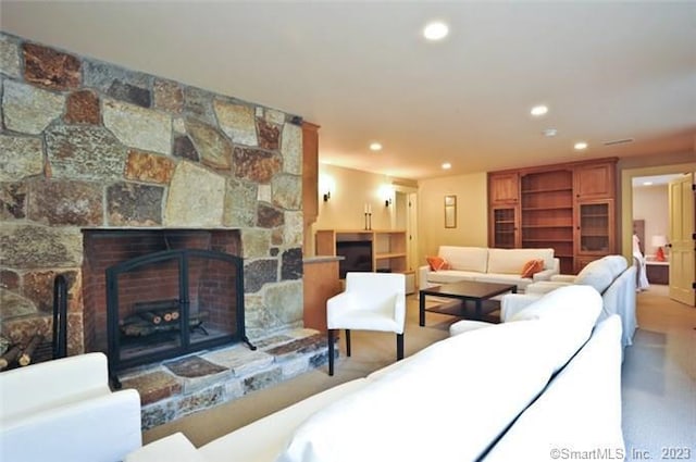 33 Sentry Hill Rd, Roxbury, CT 06783 - living area with recessed lighting and a stone fireplace