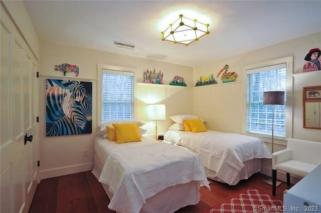 33 Sentry Hill Rd, Roxbury, CT 06783 - bedroom with a closet, baseboards, and wood finished floors